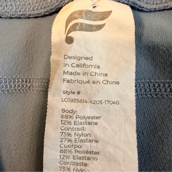 Fabletics | Blue Leggings with Signature Reflective White Side Stripe - Picture 9 of 9